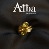 Brass Ring In Gold With Peridot Cut Stones